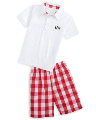 White polo shirt with red and white checkered trim and red plaid pants on a white background