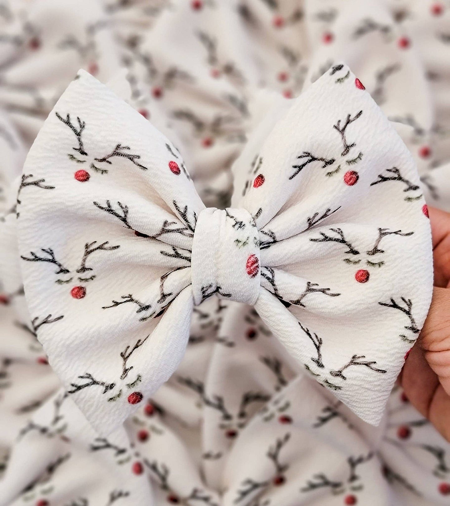 Reindeer with a Red Nose Savannah Bow