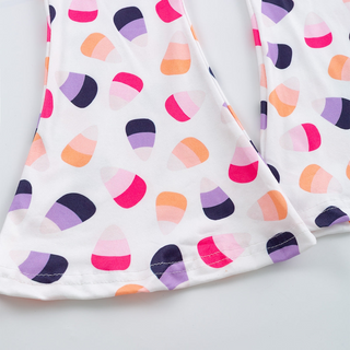 Colorful polka dot fabric on a white background