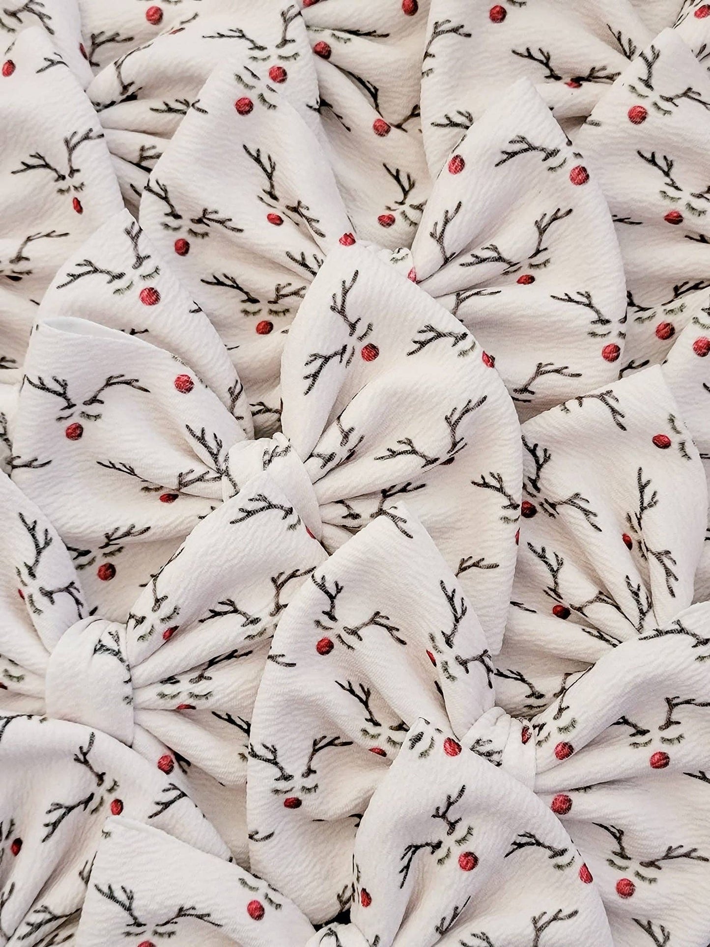 Reindeer with a Red Nose Savannah Bow