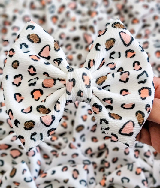 Coral and Brown Leopard Savannah Bow