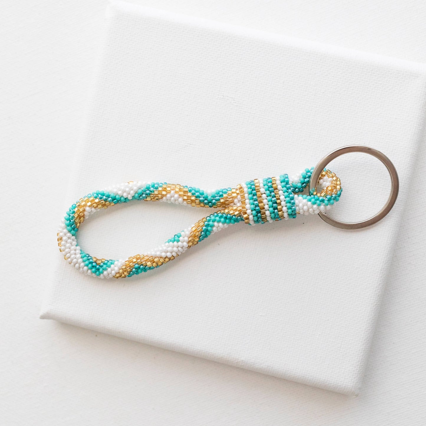 The Original Roll-On® Keychain - Aquamarine