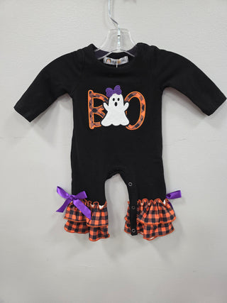 Black Halloween-themed baby romper with ghost design and plaid ruffles on a white background
